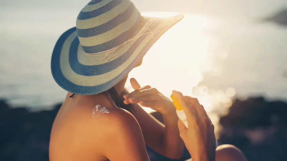Woman with Sunblock